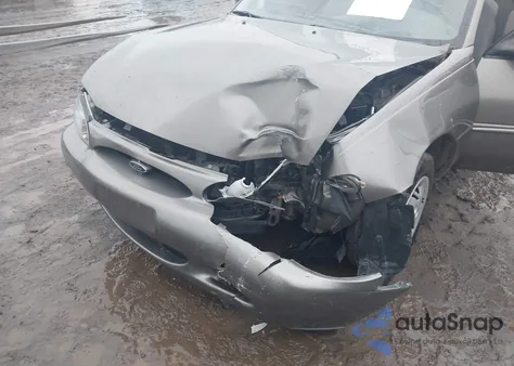 2002 Ford Escort Fleet из США, поврежденный, VIN 3FAFP13P82R140942